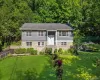 Set high on a shy, beautifully landscaped acre you’ll find this move-in condition, 4 bedroom, 3 bathroom home. Set high on a shy, beautifully landscaped acre you’ll find this move-in condition, 4 bedroom, 3 bathroom home.