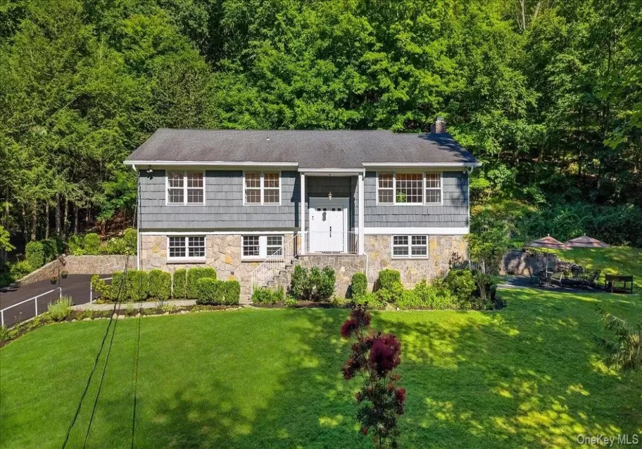 Set high on a shy, beautifully landscaped acre you’ll find this move-in condition, 4 bedroom, 3 bathroom home. Set high on a shy, beautifully landscaped acre you’ll find this move-in condition, 4 bedroom, 3 bathroom home.