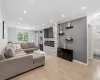 Spacious living room flows seamlessly into dining area Spacious living room flows seamlessly into dining area