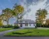 Modern exterior with white siding and dark trim Modern exterior with white siding and dark trim