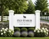 Future Entry sign featuring white posts and a stone wall base! WELCOME TO OLD STABLES ESTATES Future Entry sign featuring white posts and a stone wall base! WELCOME TO OLD STABLES ESTATES