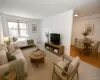 Photo Visually Staged - The living room has covered parquet floors, Western exposures. The living area is approx. 20'-11" x 11'-7" Photo Visually Staged - The living room has covered parquet floors, Western exposures. The living area is approx. 20'-11" x 11'-7"