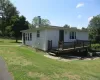 shows entrance by driveway and from deck side shows entrance by driveway and from deck side
