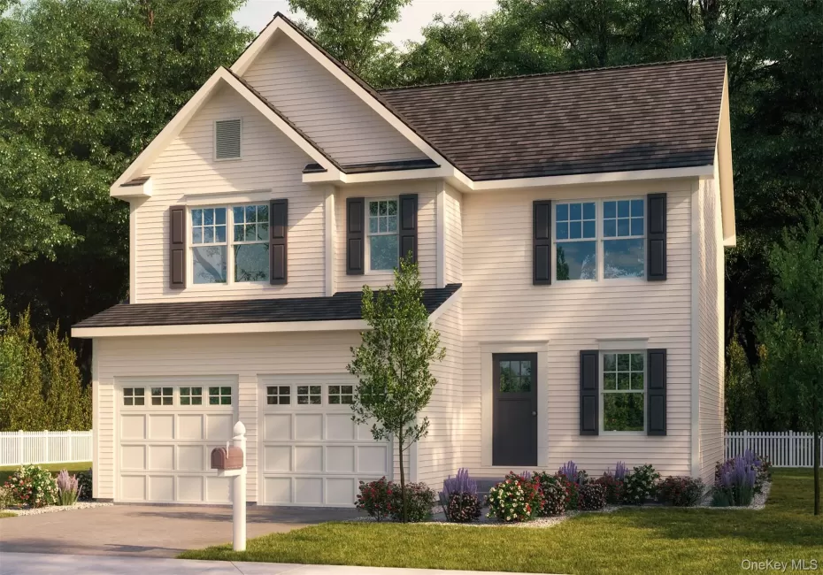 Traditional-style house with an attached garage and driveway Traditional-style house with an attached garage and driveway