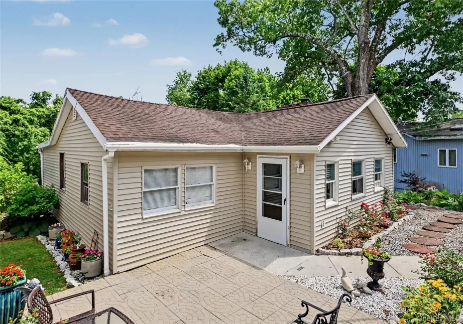 Charming ranch style home with beautiful gardens. Charming ranch style home with beautiful gardens.