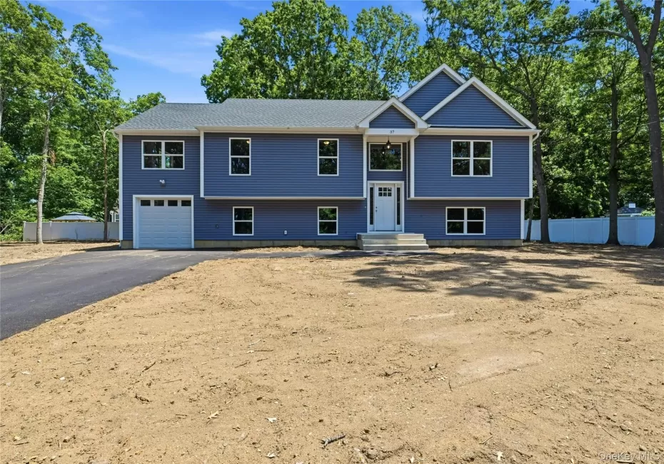 Brand new Raised Ranch just under 3,000 square feet of beautifully designed living space, set on a spacious half-acre lot on a newly developed road. Brand new Raised Ranch just under 3,000 square feet of beautifully designed living space, set on a spacious half-acre lot on a newly developed road.