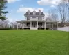 View of front of property with a large porch View of front of property with a large porch