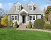 Cape cod home with a front lawn Cape cod home with a front lawn