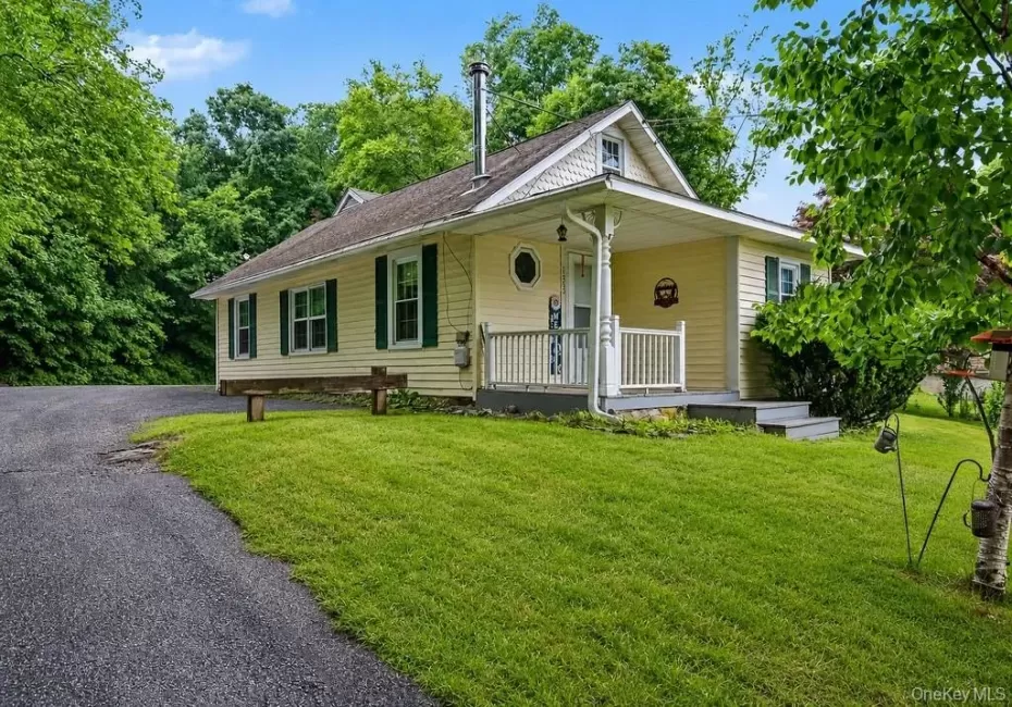 Welcoming covered front porch greets you at 1352 Route 6! Welcoming covered front porch greets you at 1352 Route 6!