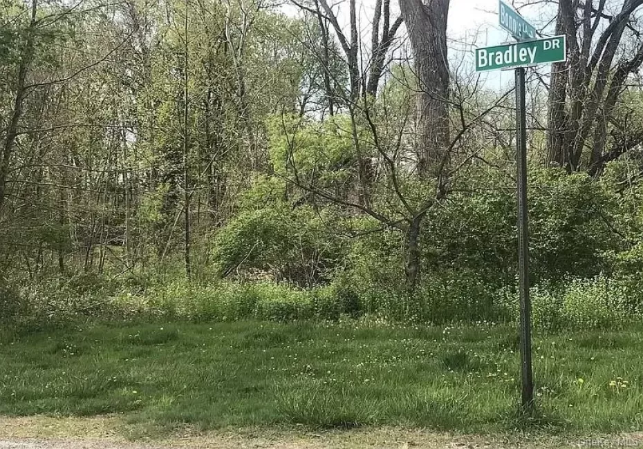 A beautiful lot tucked into a quiet street. A beautiful lot tucked into a quiet street.