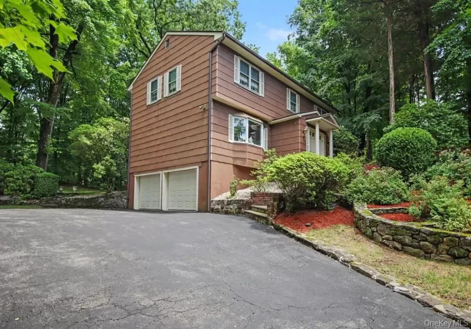 Attached two car garage and driveway parking Attached two car garage and driveway parking