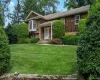35 Pinehurst sits proudly with lush lawn and landscaping accented by stone walls lining the driveway as you approach the house. 35 Pinehurst sits proudly with lush lawn and landscaping accented by stone walls lining the driveway as you approach the house.