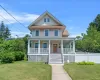 View of front of property with a wrap around porch View of front of property with a wrap around porch