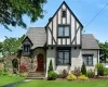 Tudor-style exterior featuring stucco and timber framing Tudor-style exterior featuring stucco and timber framing