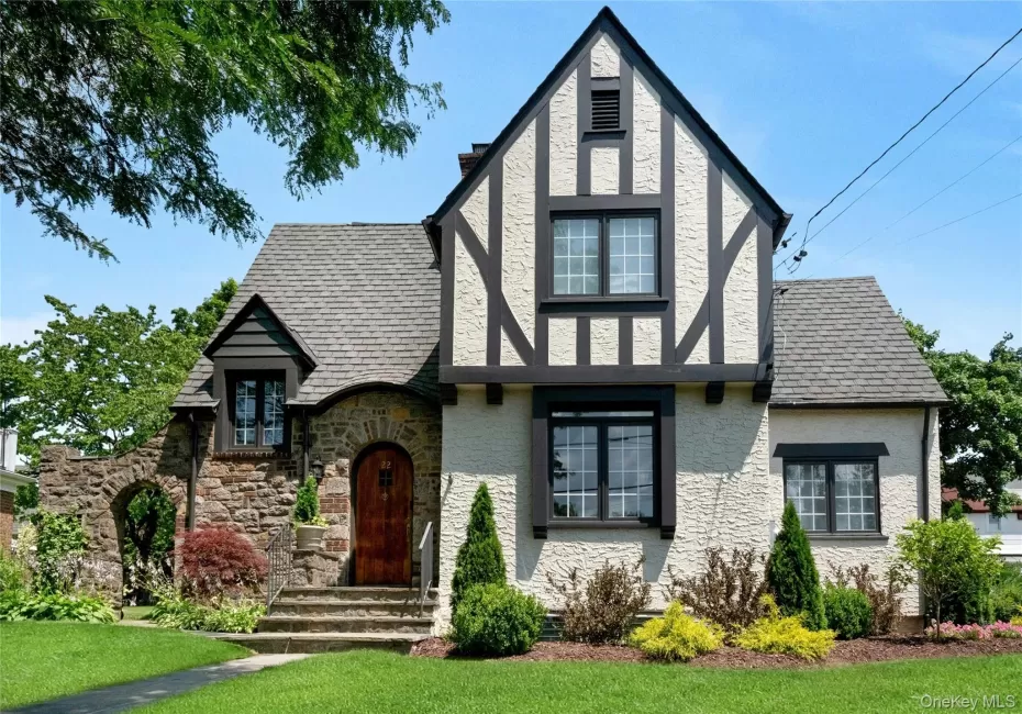 Tudor-style exterior featuring stucco and timber framing Tudor-style exterior featuring stucco and timber framing