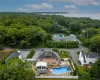 Aerial view of this turnkey Hamptons summer getaway! Aerial view of this turnkey Hamptons summer getaway!