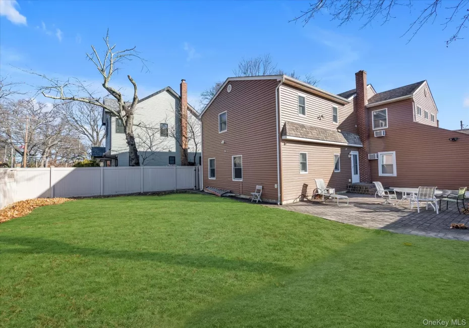 Back of property with a patio and entry steps Back of property with a patio and entry steps
