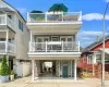 Beautifully maintained elevated home with covered parking and multiple outdoor living spaces. Beautifully maintained elevated home with covered parking and multiple outdoor living spaces.