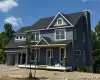 Model Construction Progress Photo. Welcoming covered front porch accented by cultured stone columns add timeless character and exceptional curb appeal as construction progresses. Model Construction Progress Photo. Welcoming covered front porch accented by cultured stone columns add timeless character and exceptional curb appeal as construction progresses.