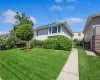 View of home's exterior with a yard View of home's exterior with a yard