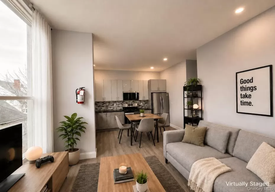 Virtually Staged Living/dining/kitchen Virtually Staged Living/dining/kitchen