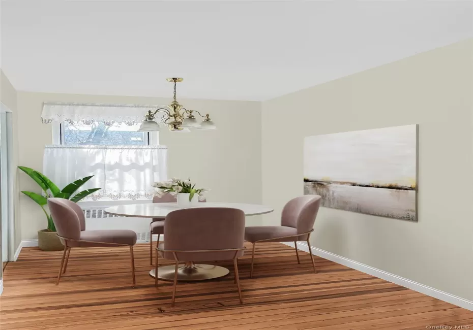 STAGED: Dining space featuring a chandelier and light wood-style floors STAGED: Dining space featuring a chandelier and light wood-style floors
