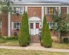 View of front of home featuring brick siding View of front of home featuring brick siding