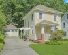 Covered front porch, side entry with pergola and 2 car detached garage. Covered front porch, side entry with pergola and 2 car detached garage.