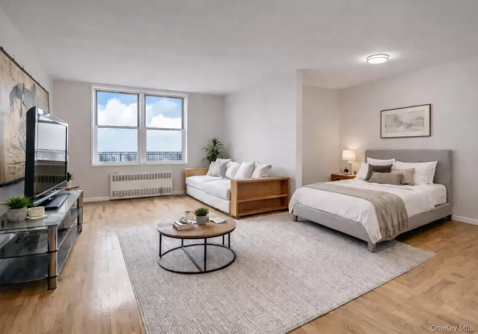 This photo is digitally staged to show where the bed can go. This photo is digitally staged to show where the bed can go.