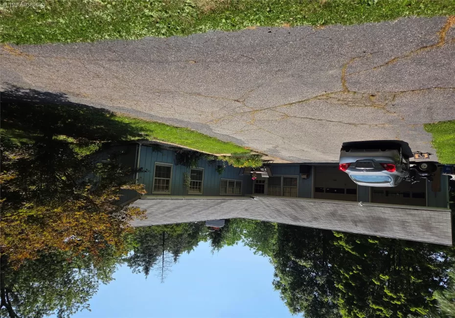 Front of the residence with several parking spaces. Front of the residence with several parking spaces.