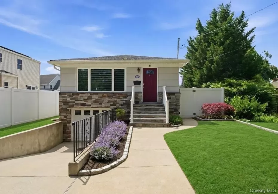 Single-story residence with beautiful curb featuring a stone facade and white siding Single-story residence with beautiful curb featuring a stone facade and white siding