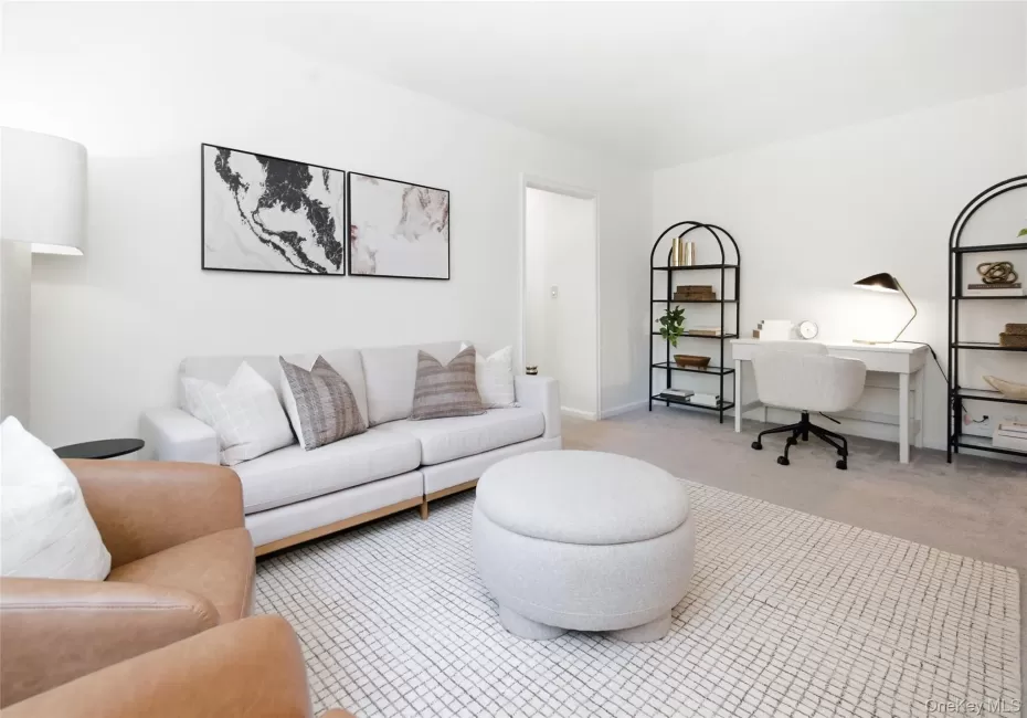Sun-filled living room featuring generous proportions and a warm, welcoming atmosphere. Sun-filled living room featuring generous proportions and a warm, welcoming atmosphere.