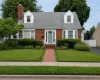 Classic Cape Cod with tidy front yard Classic Cape Cod with tidy front yard