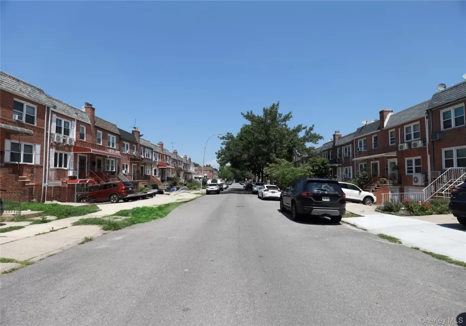 Wide, tree-lined residential street view Wide, tree-lined residential street view