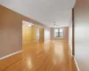 Unfurnished room with light wood-style floors and a ceiling fan Unfurnished room with light wood-style floors and a ceiling fan