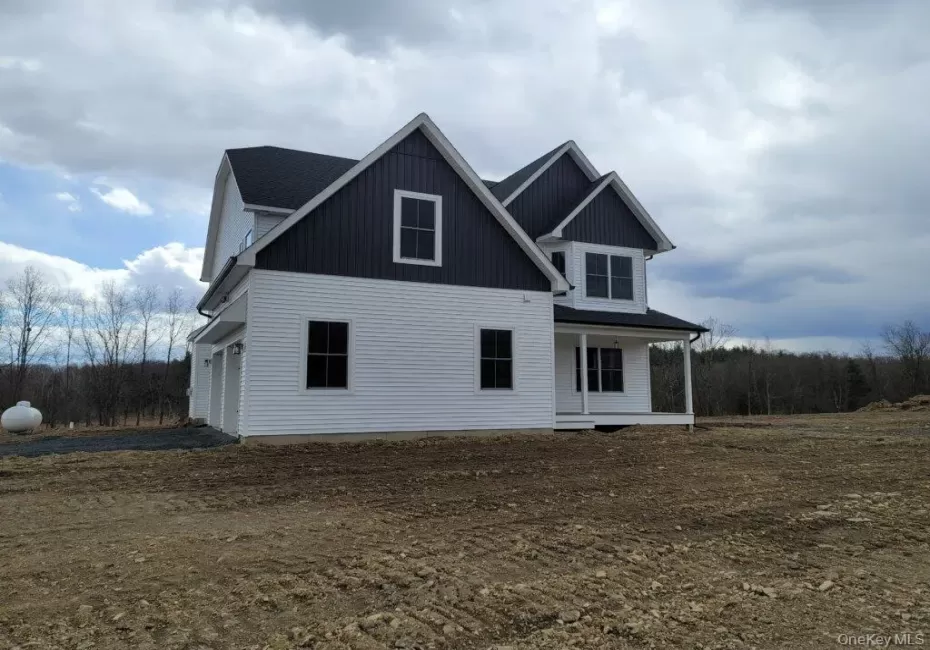Distinctive Colonial architecture highlighted by multiple gables and elegant exterior finishes that create a measurable first impression. Distinctive Colonial architecture highlighted by multiple gables and elegant exterior finishes that create a measurable first impression.