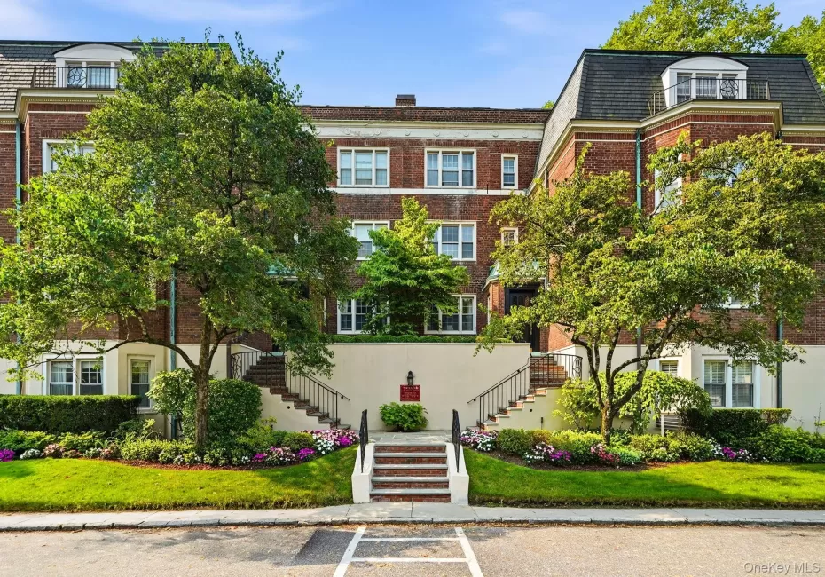 Front view of building #7 - A classic garden style apartment with beautifully maintained grounds and only steps from the Scarsdale train . Front view of building #7 - A classic garden style apartment with beautifully maintained grounds and only steps from the Scarsdale train .