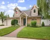 Beautifully Updated and Expanded Cape with Oversized Portico, Stone, Stucco, Vinyl Siding and newer architectural shingle roof. Beautifully Updated and Expanded Cape with Oversized Portico, Stone, Stucco, Vinyl Siding and newer architectural shingle roof.