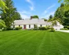 Classic and inviting front exterior welcomes you with timeless curb appeal, mature landscaping and a picturesque setting overlooking the golf course. The beautifully maintained property offers a warm first impression while showcasing the home's peaceful Fairway Farms location in the heart of Cutchogue Classic and inviting front exterior welcomes you with timeless curb appeal, mature landscaping and a picturesque setting overlooking the golf course. The beautifully maintained property offers a warm first impression while showcasing the home's peaceful Fairway Farms location in the heart of Cutchogue