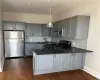 Beautiful kitchen with stainless appliances, granite countertops and seating area. Beautiful kitchen with stainless appliances, granite countertops and seating area.