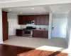 Open Floor plan kitchen and living room. Stainless Appliances, granite counters, hardwood floors. Open Floor plan kitchen and living room. Stainless Appliances, granite counters, hardwood floors.