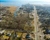 Aerial view featuring a water view Aerial view featuring a water view