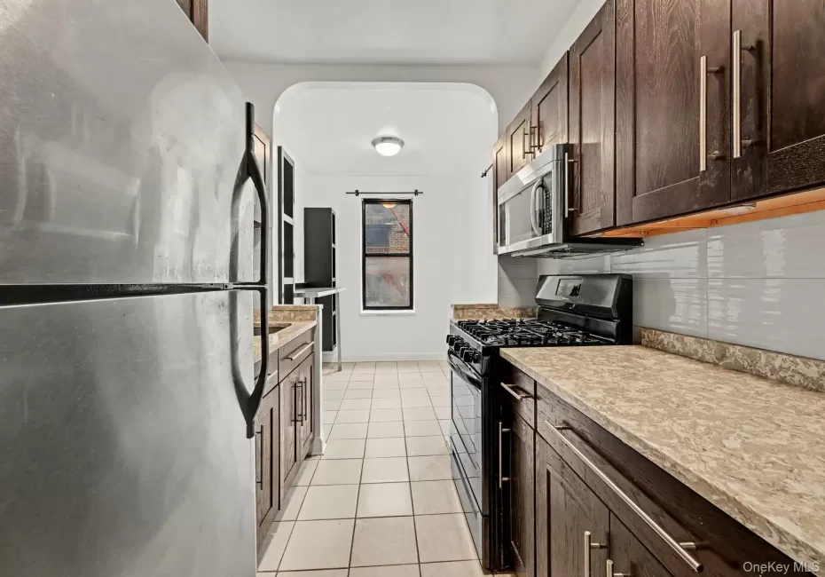 Updated kitchen with stainless steel appliances. Updated kitchen with stainless steel appliances.