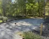 View of yard featuring a forest view View of yard featuring a forest view
