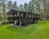Front angled view, stairs to main level porch and entry door. Lower entry door Front angled view, stairs to main level porch and entry door. Lower entry door
