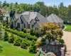 French County style exterior with country club backyard In-ground pool French County style exterior with country club backyard In-ground pool