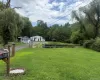 Street view of this 3 bed, 2 full bath home. Street view of this 3 bed, 2 full bath home.