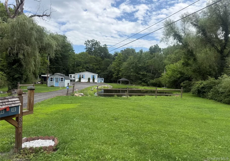 Street view of this 3 bed, 2 full bath home. Street view of this 3 bed, 2 full bath home.