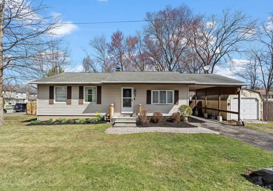 Ranch-style house featuring an outdoor structure, aphalt driveway, a front yard, a carport, and a shingled roof Ranch-style house featuring an outdoor structure, aphalt driveway, a front yard, a carport, and a shingled roof