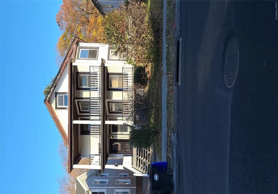 View of front facade featuring a balcony and a porch View of front facade featuring a balcony and a porch